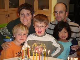 Young Eli with the Steinberg family.